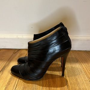 Christian Louboutin black leather booties. 4.5 inch heel. Size 40.
